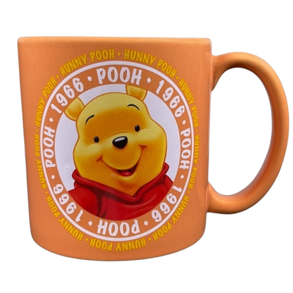Hunny Pooh 1966 collectible Disney mug featuring a smiling Winnie the Pooh design