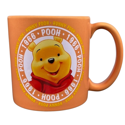 Hunny Pooh 1966 collectible Disney mug featuring a smiling Winnie the Pooh design