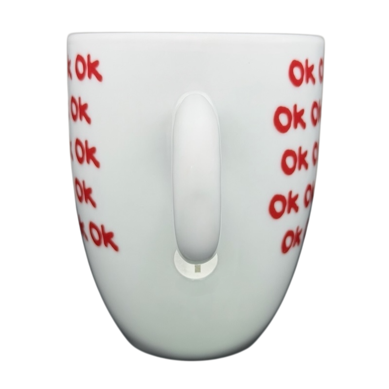 Illy Art Collection Robert Wilson OK Mug featuring a unique design with red Ok text on a white background
