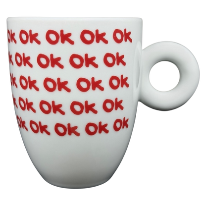 Illy Art Collection Robert Wilson OK Mug featuring a unique design with repeated red OK text