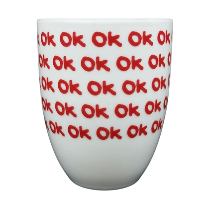 Illy Art Collection Robert Wilson OK Mug with bold red OK lettering on a white background