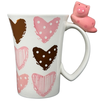 Indra Heart Polka Dot Piggy handle mug featuring colorful hearts and a cute piggy handle