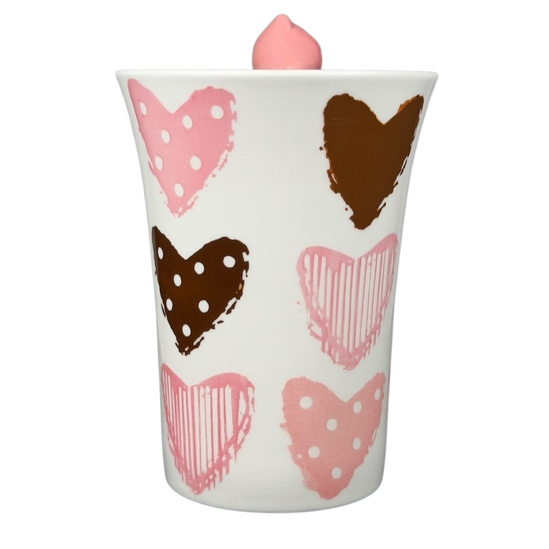 Indra Heart Polka Dot Piggy handle mug with colorful heart patterns in pink and brown