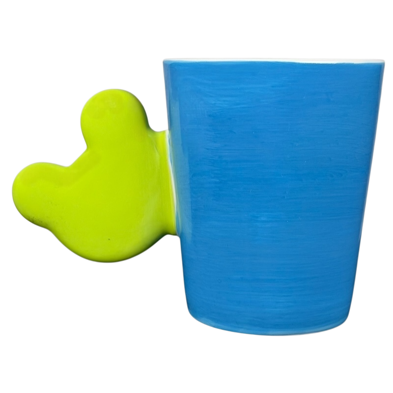 Spotted Green Frog Mug Indra with a playful green handle and blue ceramic body