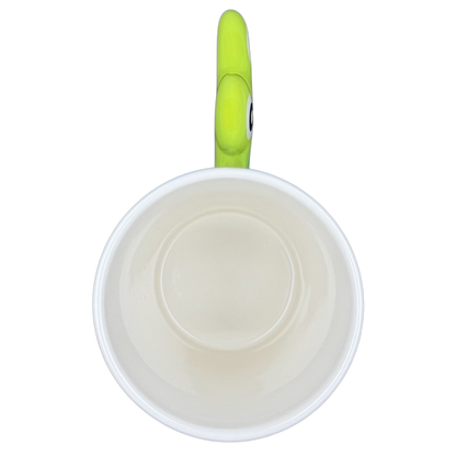 Top view of Spotted Green Frog Mug Indra showcasing a simple design with a vibrant green handle