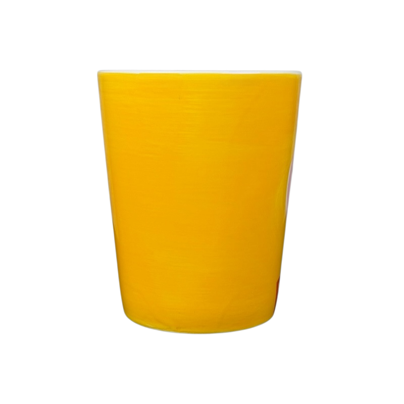 Bright yellow ceramic cup from Indra Fine Stoneware, perfect for beverages or decorative use