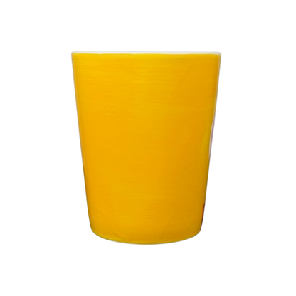 Bright yellow ceramic cup from Indra Fine Stoneware, perfect for beverages or decorative use