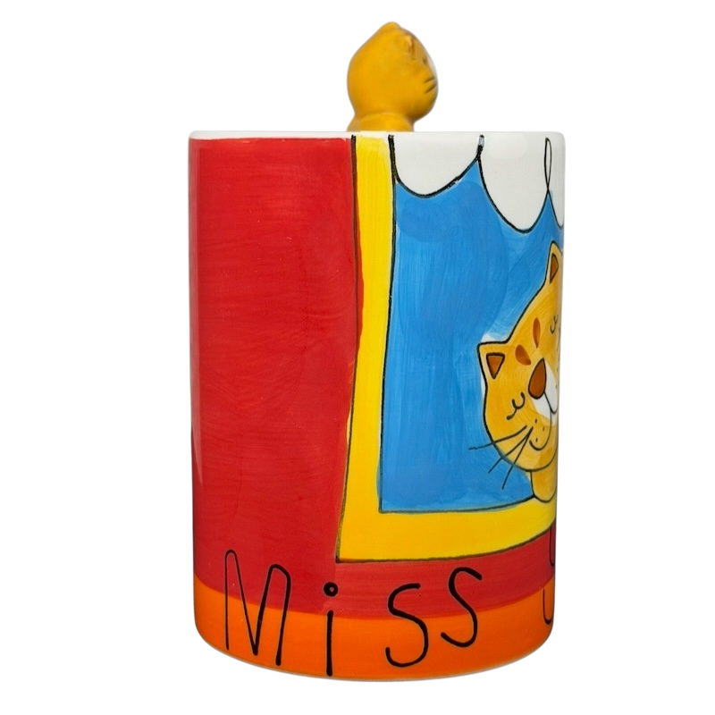 Indra vintage cat handle mug featuring a playful cat illustration and colorful design