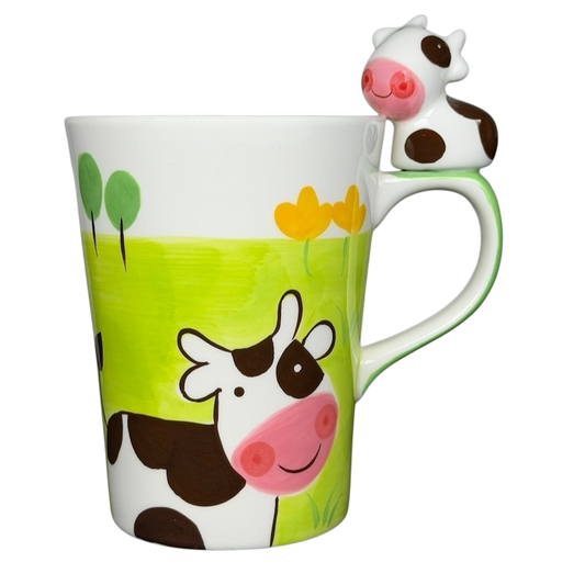 Indra vintage cow handle mug featuring a playful cow design and a cute cow-shaped handle