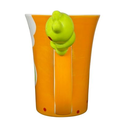 Indra vintage frog butterfly handle mug featuring a vibrant orange color and playful frog design