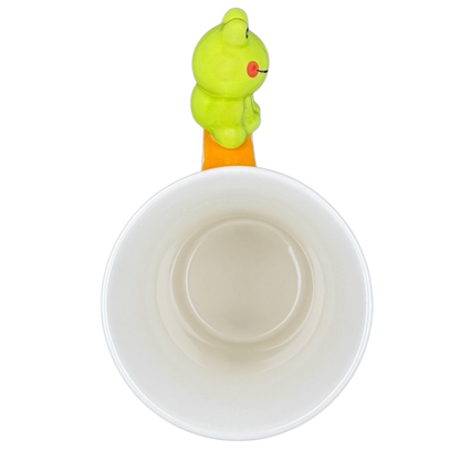 Indra vintage frog butterfly handle mug with a green frog-shaped handle on an orange base