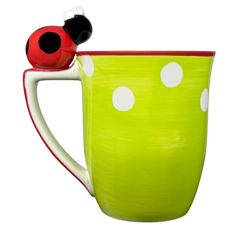 Indra vintage ladybug handle mug in bright green with white polka dots and a playful ladybug design