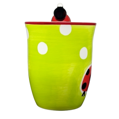Indra vintage ladybug handle mug in vibrant green with white polka dots and ladybug design