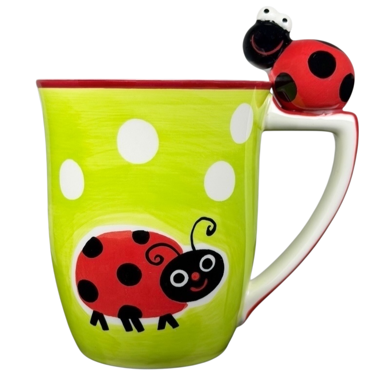 Indra vintage ladybug handle mug with bright green background and whimsical ladybug design