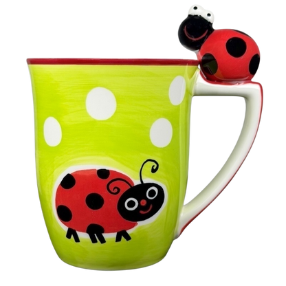 Indra vintage ladybug handle mug with bright green background and whimsical ladybug design
