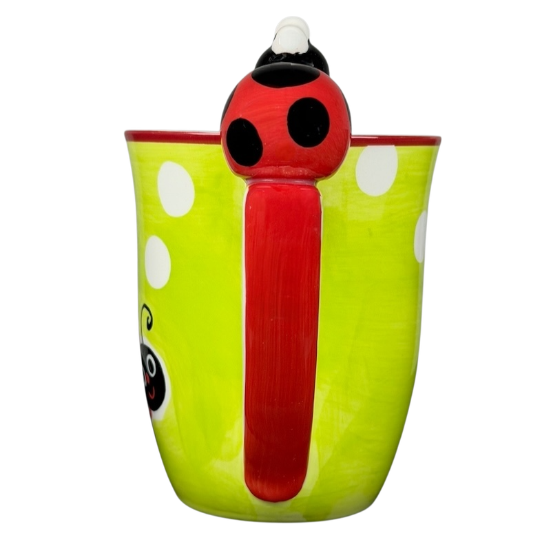 Indra vintage ladybug handle mug in bright green with white dots and a charming ladybug handle