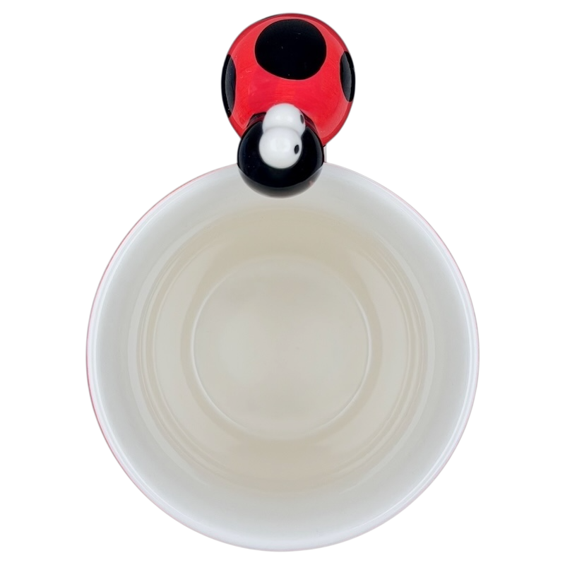 Indra vintage ladybug handle mug with a colorful handle design and smooth white interior