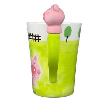 Indra vintage pig handle mug featuring a cute pink pig design and vibrant green color