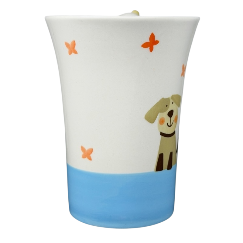 Indra vintage puppies butterflies handle mug with playful dog and butterfly designs on a white background
