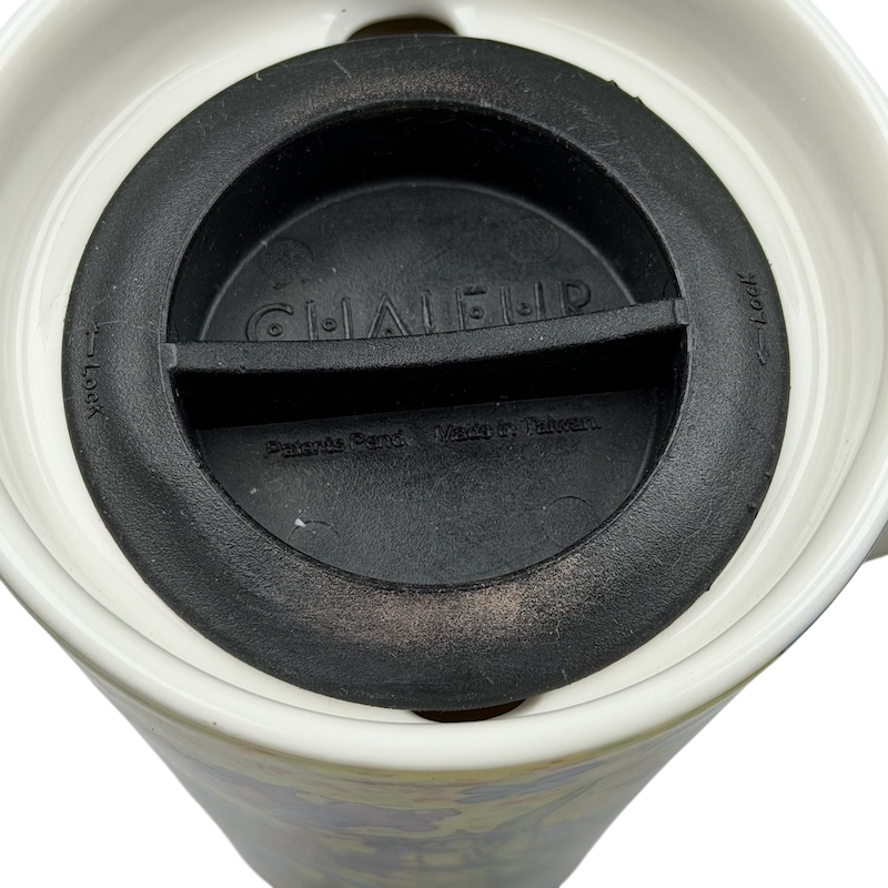 Bottom view of Chaleur Irises Vincent Van Gogh Mug showing silicone lid and locking mechanism