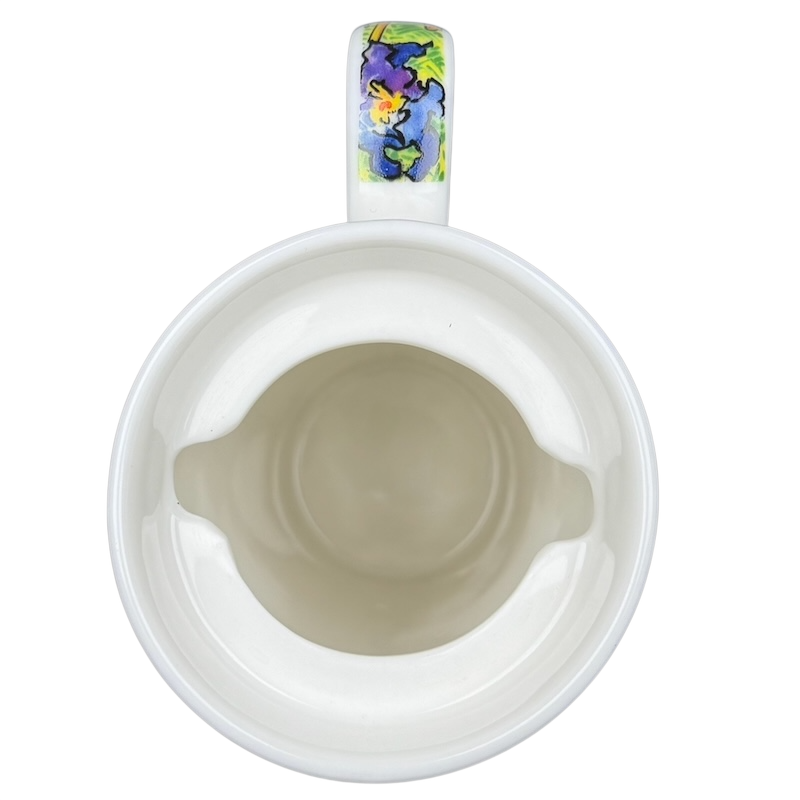 Inside view of Irises Vincent Van Gogh Mug Chaleur showcasing its unique design and vibrant handle
