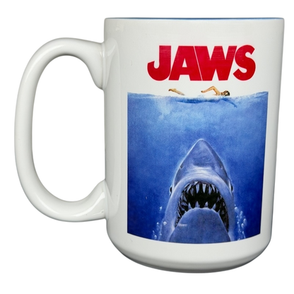 Jaws movie poster Universal Studios mug featuring a shark and swimmer illustration