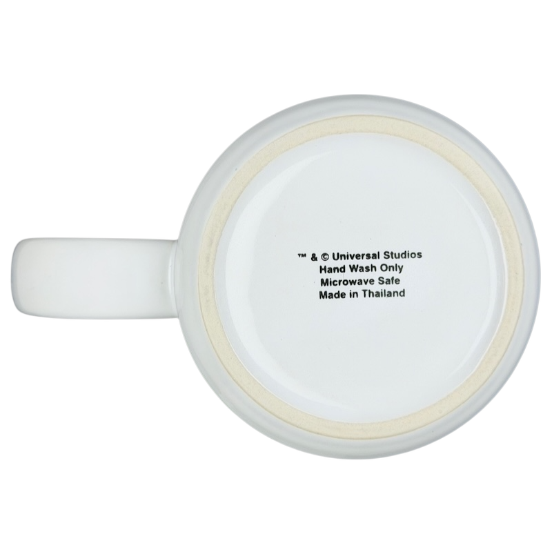 Bottom view of a Jaws movie poster Universal Studios mug showing care instructions and manufacturing details