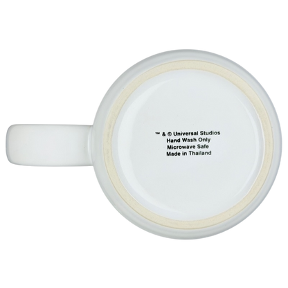 Bottom view of a Jaws movie poster Universal Studios mug showing care instructions and manufacturing details