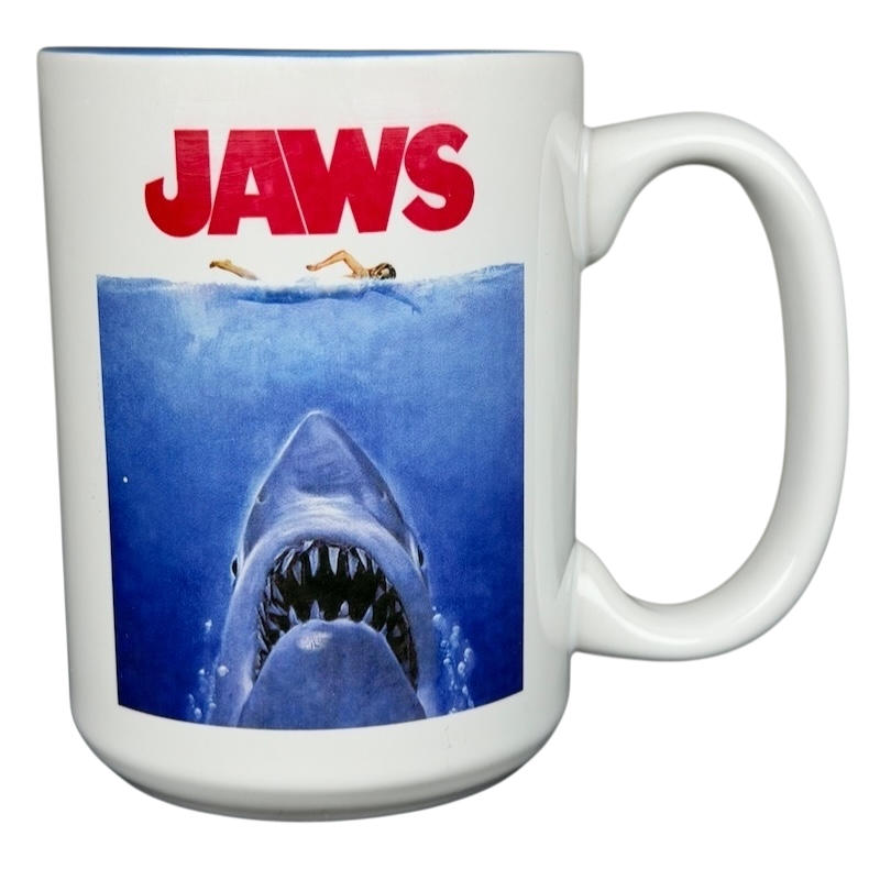 Jaws movie poster Universal Studios mug featuring a dramatic shark image and vintage design