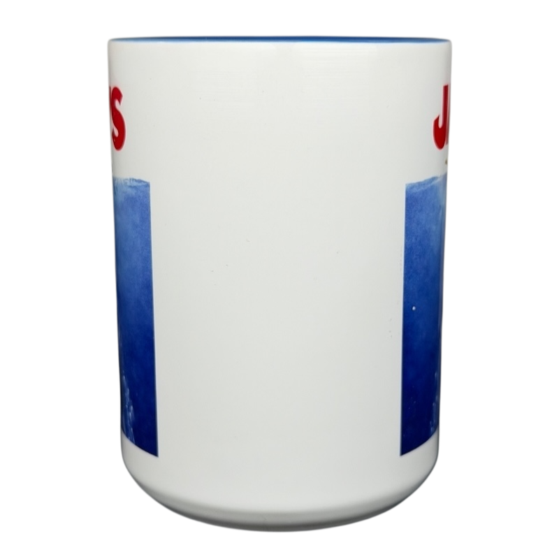 Jaws movie poster Universal Studios mug featuring iconic shark artwork and bold red lettering