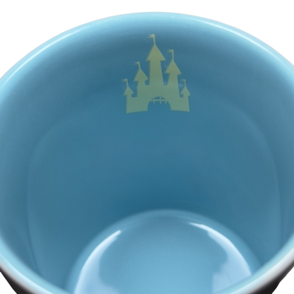 Inside view of a Jerrod Maruyama Disney mug featuring a castle design in soft colors