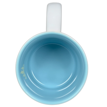 Top view of a blue interior Jerrod Maruyama Disney mug showcasing its sleek design