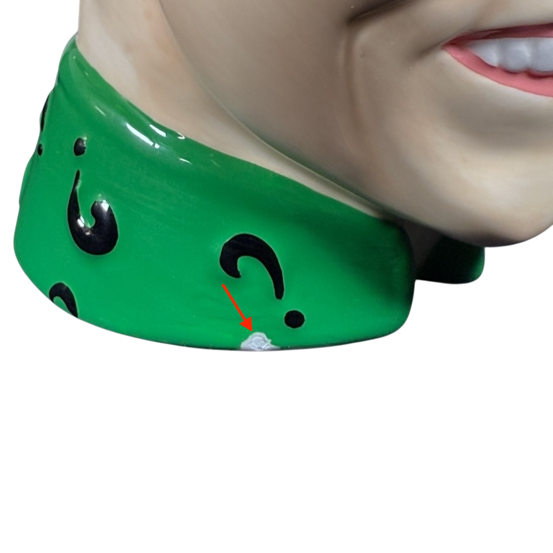 Close-up of Jim Carrey Riddler vintage 3D mug showing green collar with black question marks and small paint chip
