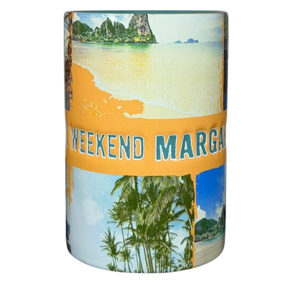 Jimmy Buffett Margaritaville Livin' For The Weekend mug featuring tropical beach designs and vibrant colors