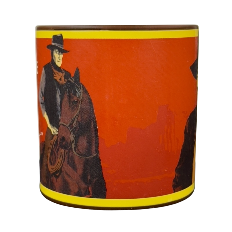 A Man's Got To Have A Code John Wayne vintage brown mug featuring classic cowboy imagery and vibrant colors