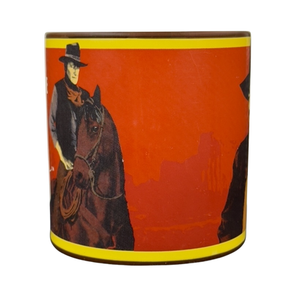 A Man's Got To Have A Code John Wayne vintage brown mug featuring classic cowboy imagery and vibrant colors