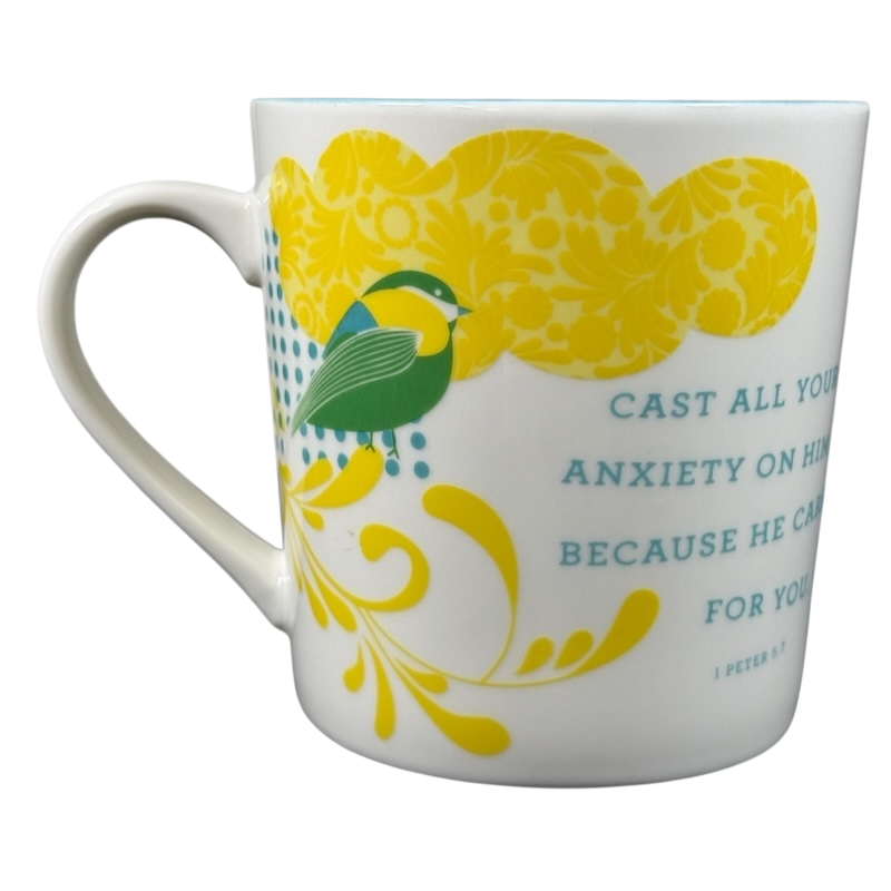 Joyce Meyer collectible mug with yellow floral design, green bird, and inspirational Bible verse print