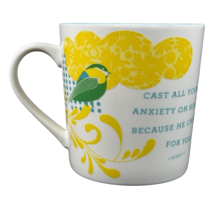 Joyce Meyer collectible mug with yellow floral design, green bird, and inspirational Bible verse print