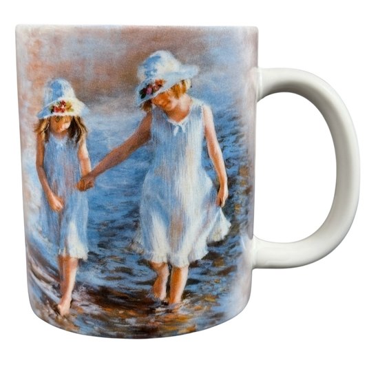 Kathryn Fincher vintage Amcal mug collectible featuring two girls in blue dresses walking by the water