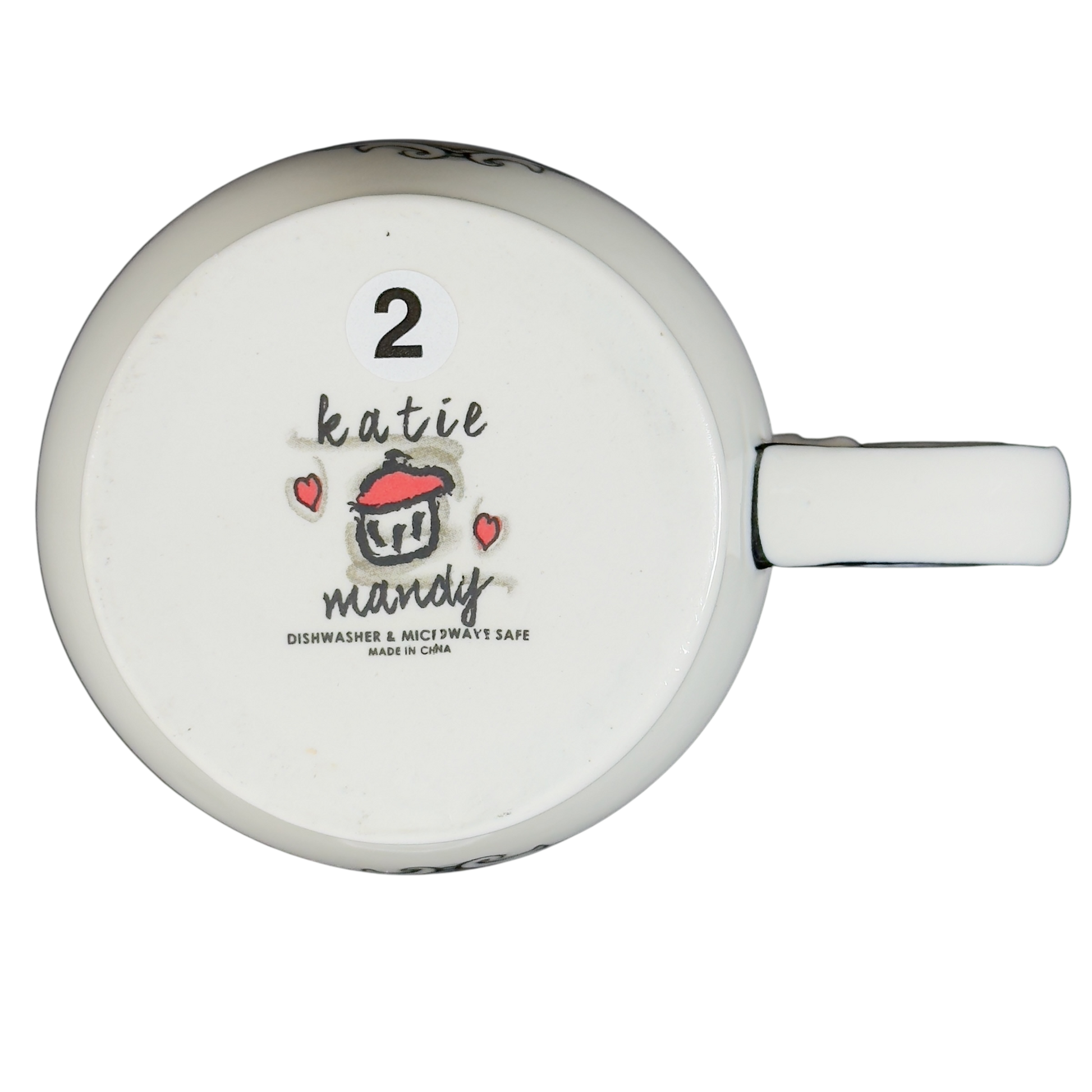Bottom view of Katie Mandy collectible mug with logo and dishwasher safe label