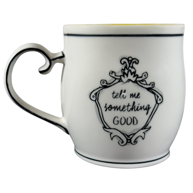 Katie Mandy collectible mug white ceramic with black decorative text and elegant handle