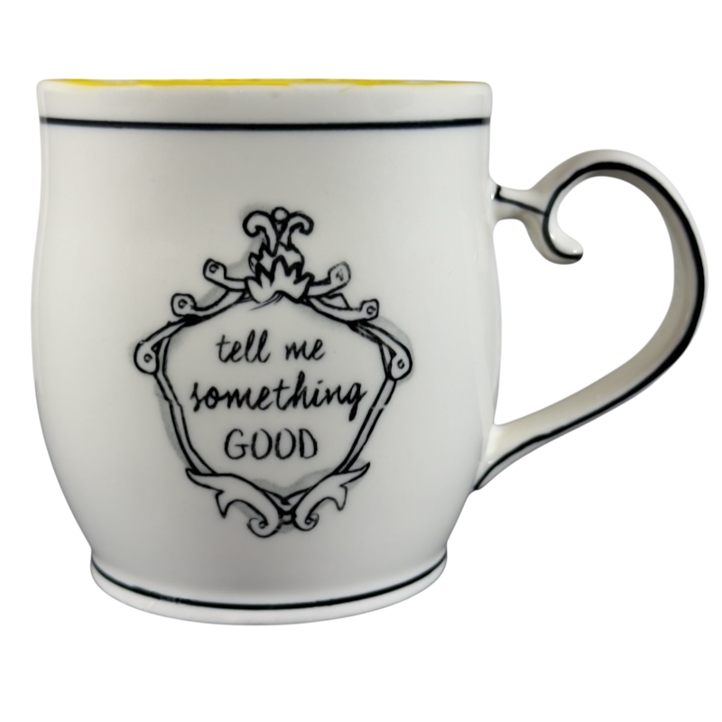 Katie Mandy collectible mug with black decorative frame and quote tell me something good