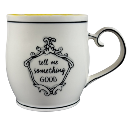 Katie Mandy collectible mug with black decorative frame and quote tell me something good