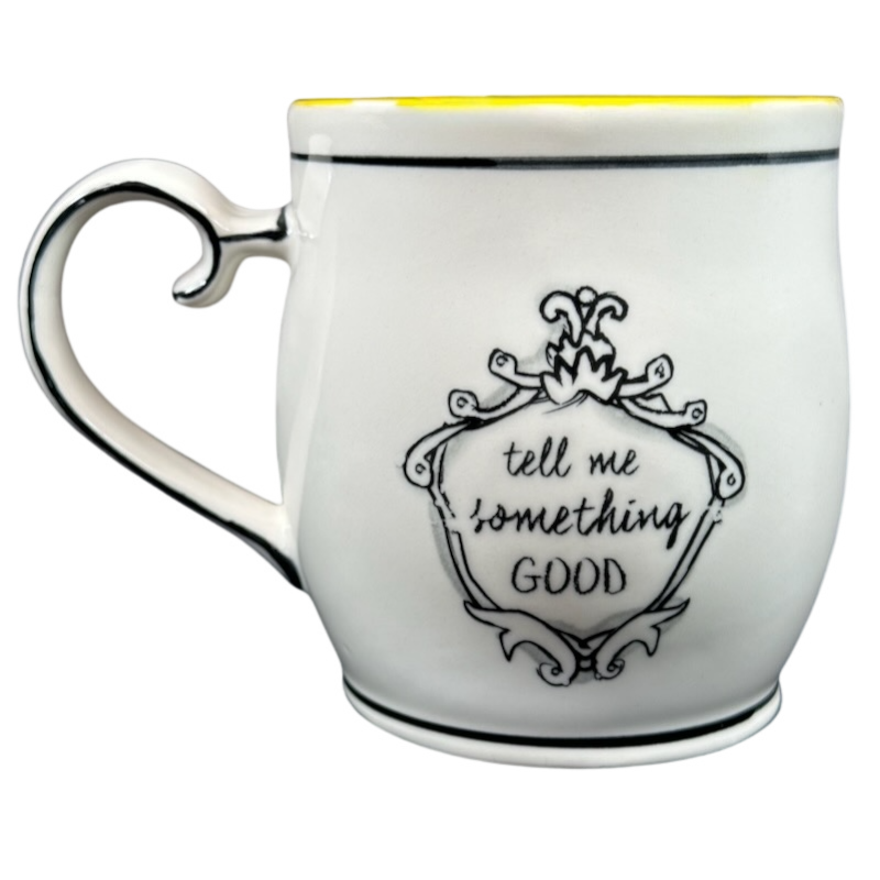 Katie Mandy collectible mug with black decorative text tell me something good on white ceramic