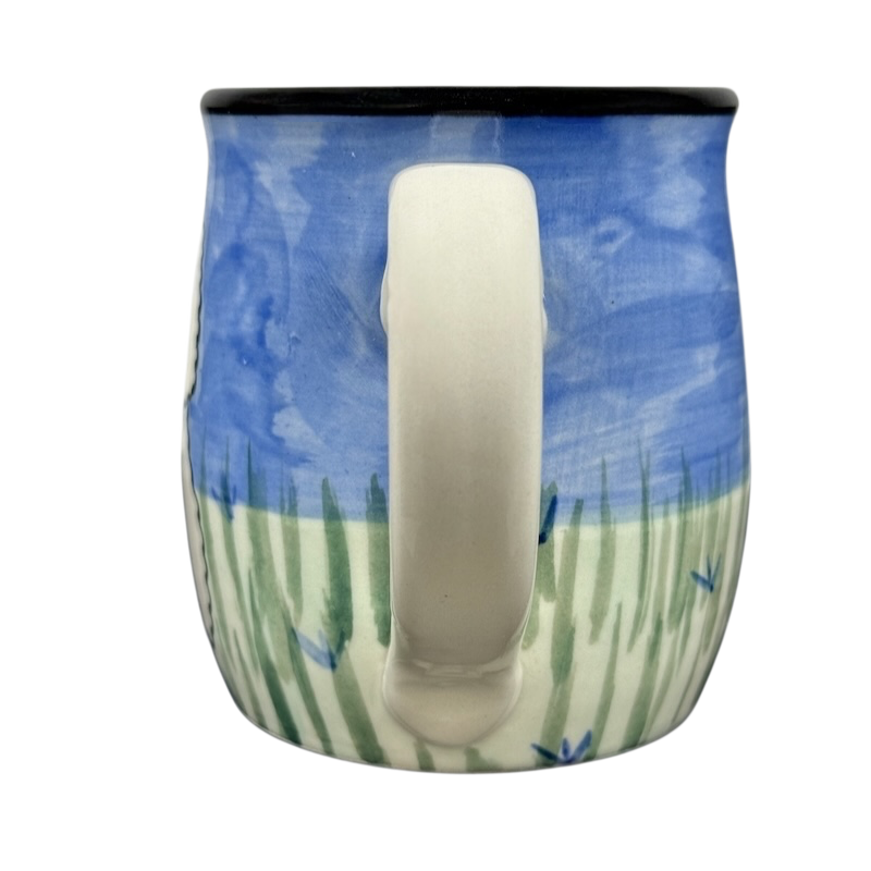 Karen Donleavy Bichon Frise mug ceramic hand painted blue sky and green grass motif with handle