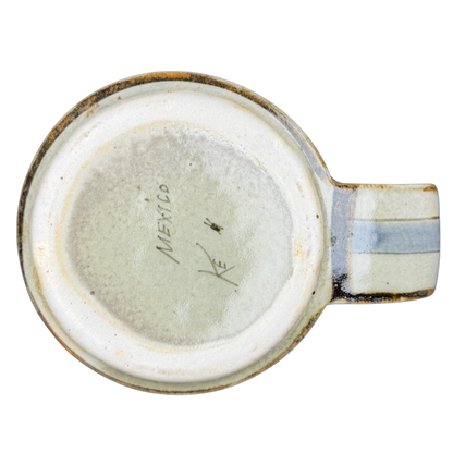 Bottom view of Ken Edwards Mexican pottery quail mug showcasing the artist's signature and detailed craftsmanship