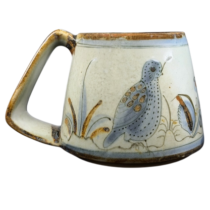 Ken Edwards Mexican pottery quail mug with detailed bird design and earthy colors