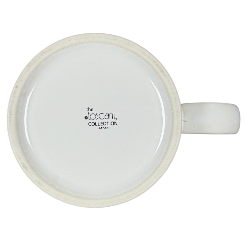 White ceramic mug bottom with The Toscany Collection Japan logo Kenneth Grooms Toscany Collection vintage lawyers mug.