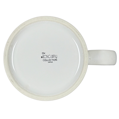 White ceramic mug bottom with The Toscany Collection Japan logo Kenneth Grooms Toscany Collection vintage lawyers mug.