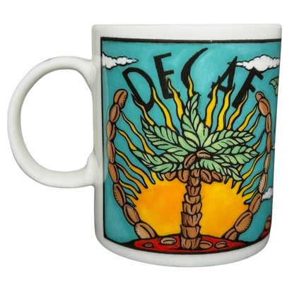 Decaf Kris Fisher Chaleur mug ceramic coffee cup with colorful palm tree sun and coffee bean artwork